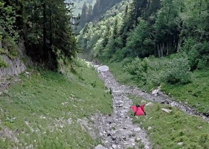 Wingsuit Terrain flight through Crack In Switzerland