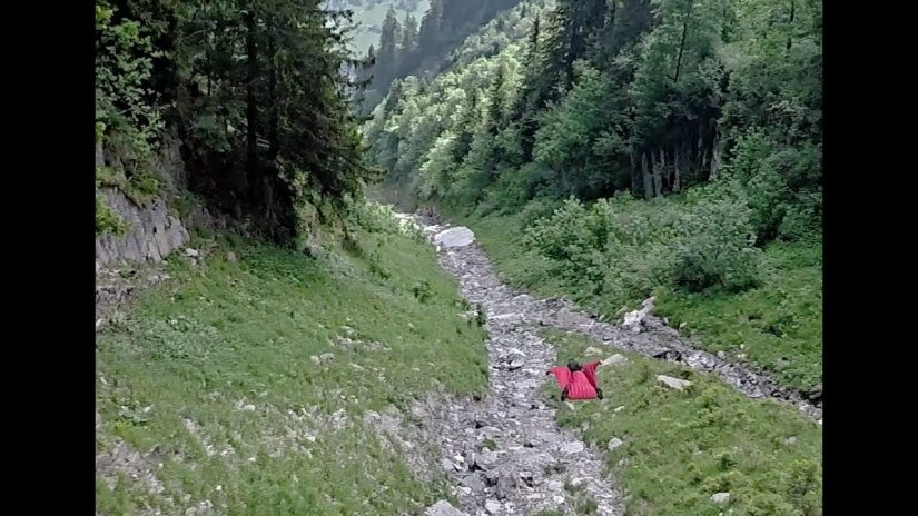 Wingsuit Terrain flight through Crack In Switzerland